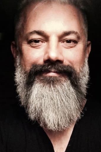 Tonguç Oksal fotoğrafı
